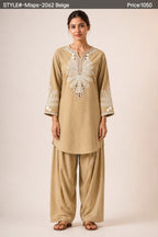 Exclusive Floral Embroidered Off-White Short Kurti & Magenta Bottom Se