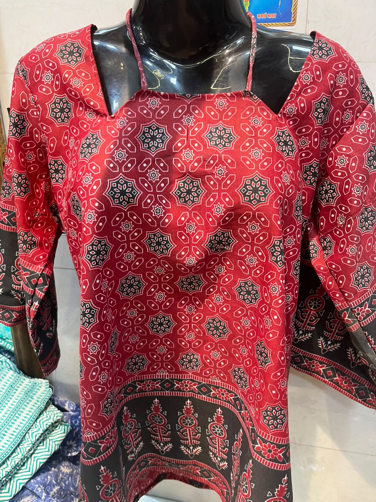 Elegant Floral Printed Maroon Short Kurti with Strappy Neck Detail
